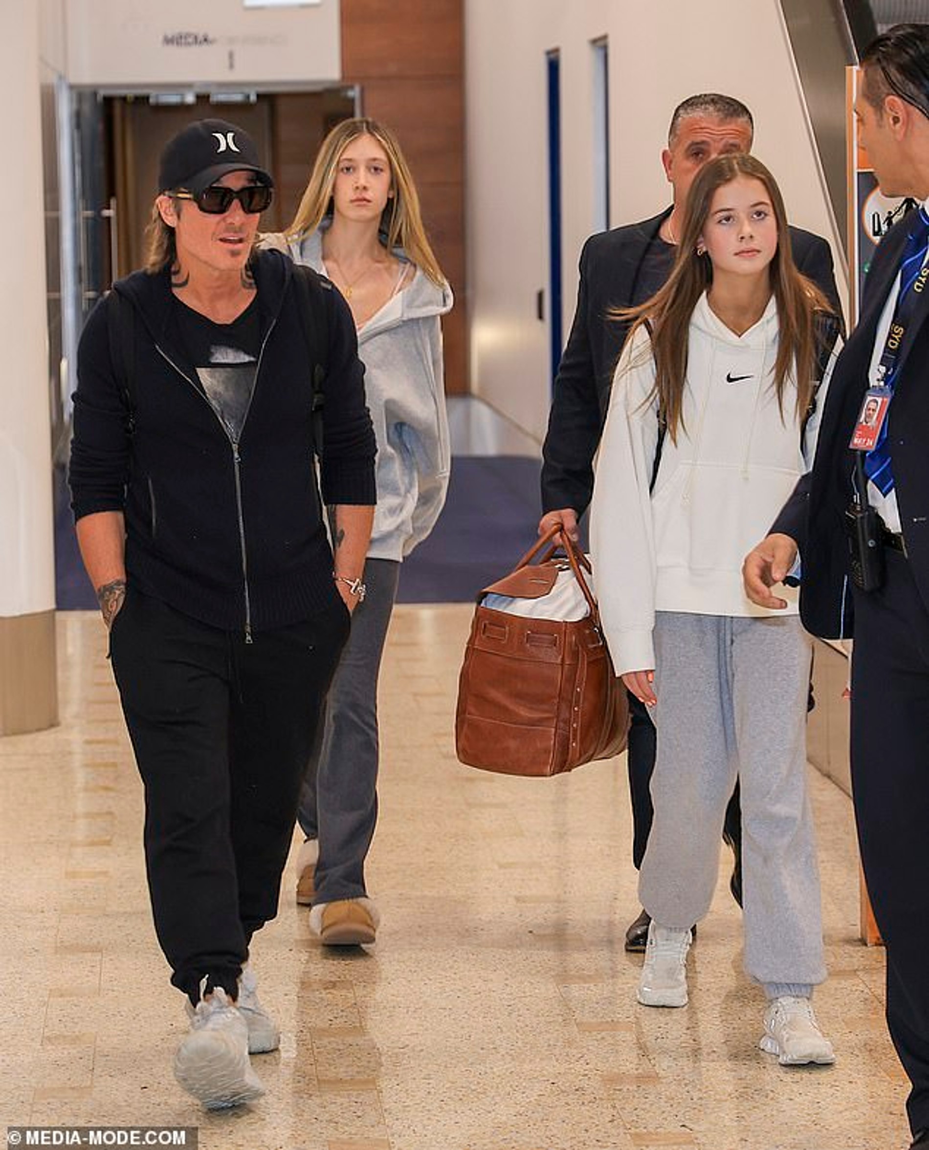 Кит Урбан с дочерьми. Фото: media-mode.com